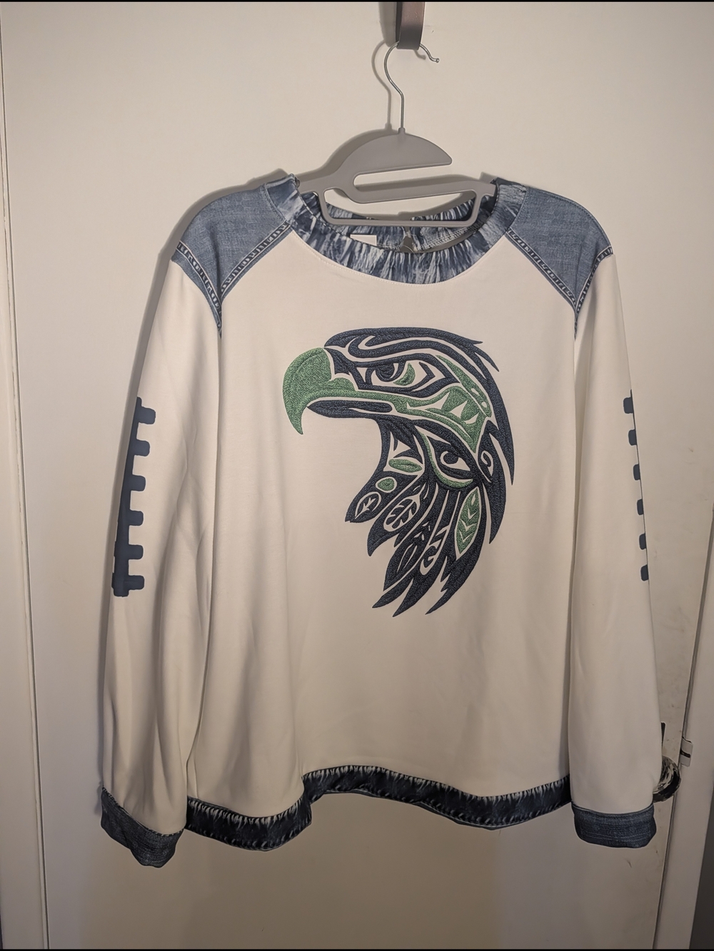 White Crew NeckTribal Deign Seahawks Sweater with Green & Navy Eagle Graphic